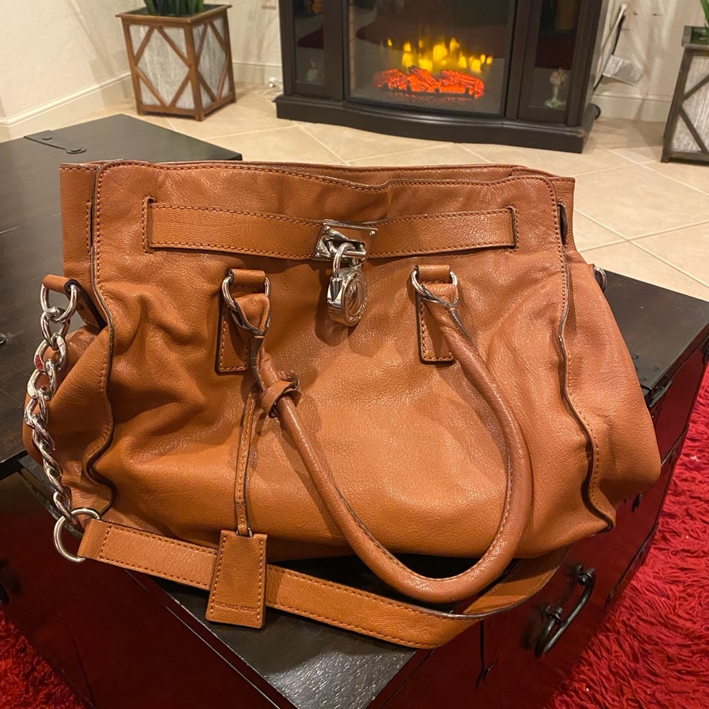 Michael Kors. Gorgeous tan leather with silver hardware.